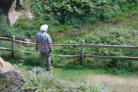 Simon Davey contemplating an amphibian pond, Grosnez Point, Jersey